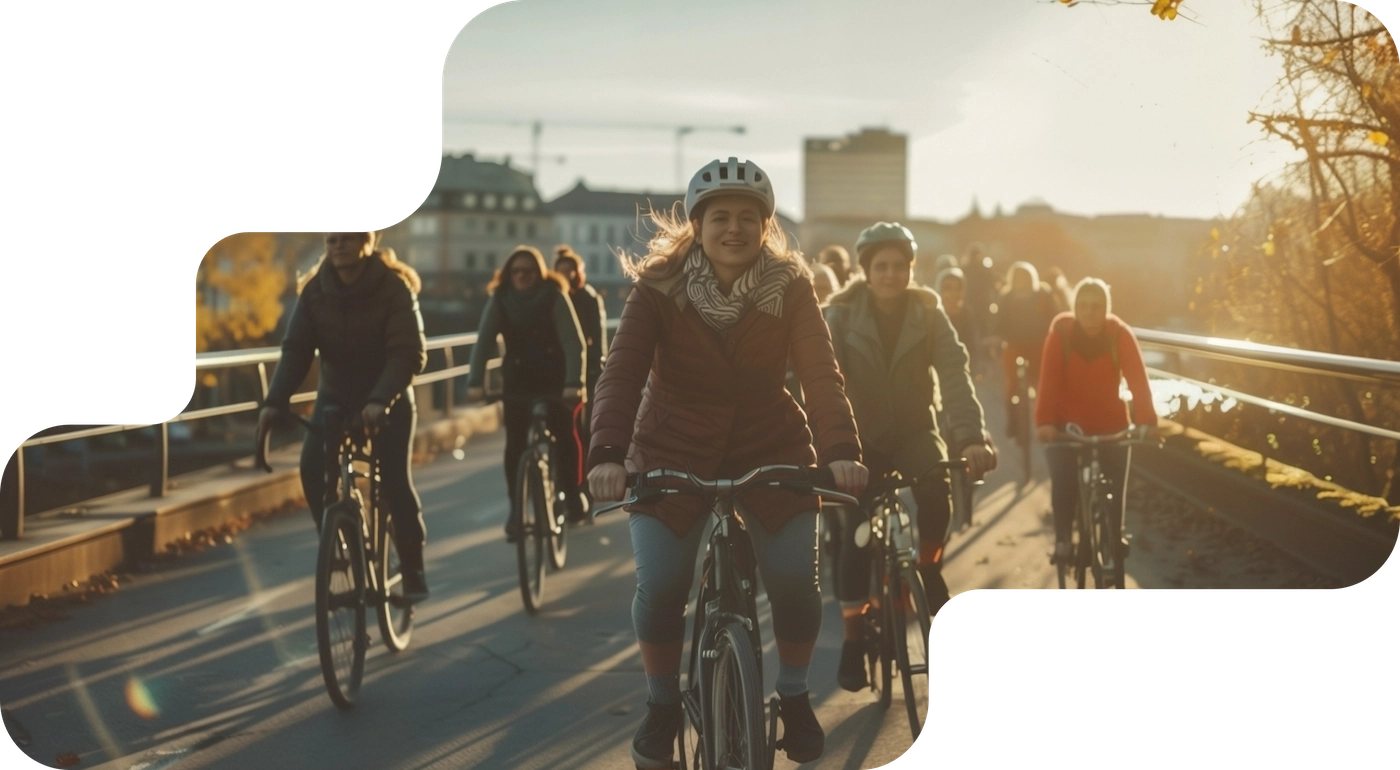 Cycling group on a city bridge, booking system for bike, e-bike and Segway tours