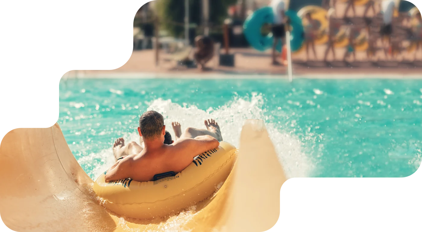 Guests rafting on turquoise water, booking system for leisure and water parks