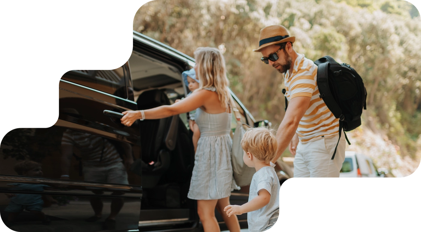 Family with children getting into a booked transfer van